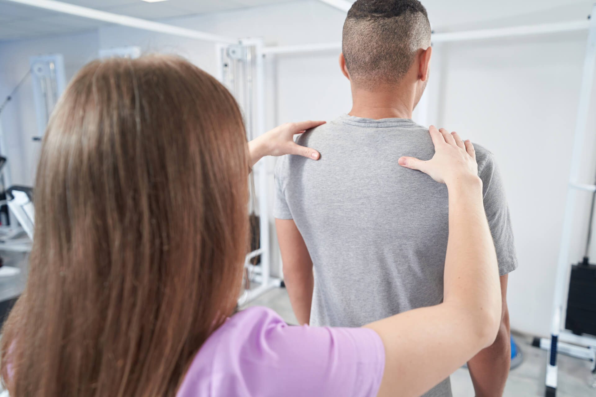 man-receiving-physiotherapy-treatment-in-modern-cl-2023-11-27-05-29-21-utc-1-1