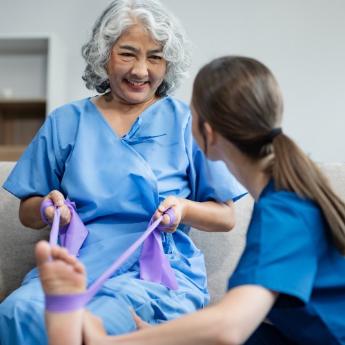 A Professional Physiotherapist Performing A Clinical Assessment Of An Elderly Woman&Amp;Apos;S Arm And Joint Mobility During A Physiotherapy Edmonton Session At In Step Physical Therapy. A Professional Physiotherapist Performing A Clinical Assessment Of An Elderly Woman&Amp;Apos;S Arm And Joint Mobility During A Physiotherapy Edmonton Session At In Step Physical Therapy.
