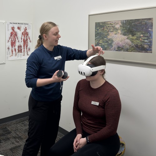 A Professional Therapist Performing A Manual Therapy Technique On A Patient&Amp;Apos;S Neck During A Physiotherapy Edmonton Session At In Step Physical Therapy. A Professional Therapist Performing A Manual Therapy Technique On A Patient&Amp;Apos;S Neck During A Physiotherapy Edmonton Session At In Step Physical Therapy.