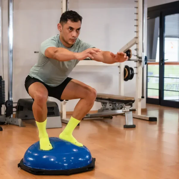 Balance Training Physiotherapy Edmonton Session With Patient Performing Stability Exercises In A Gym Setting At In Step Physical Therapy Balance Training Physiotherapy In Edmonton Exercise Session | In Step Physical Therapy